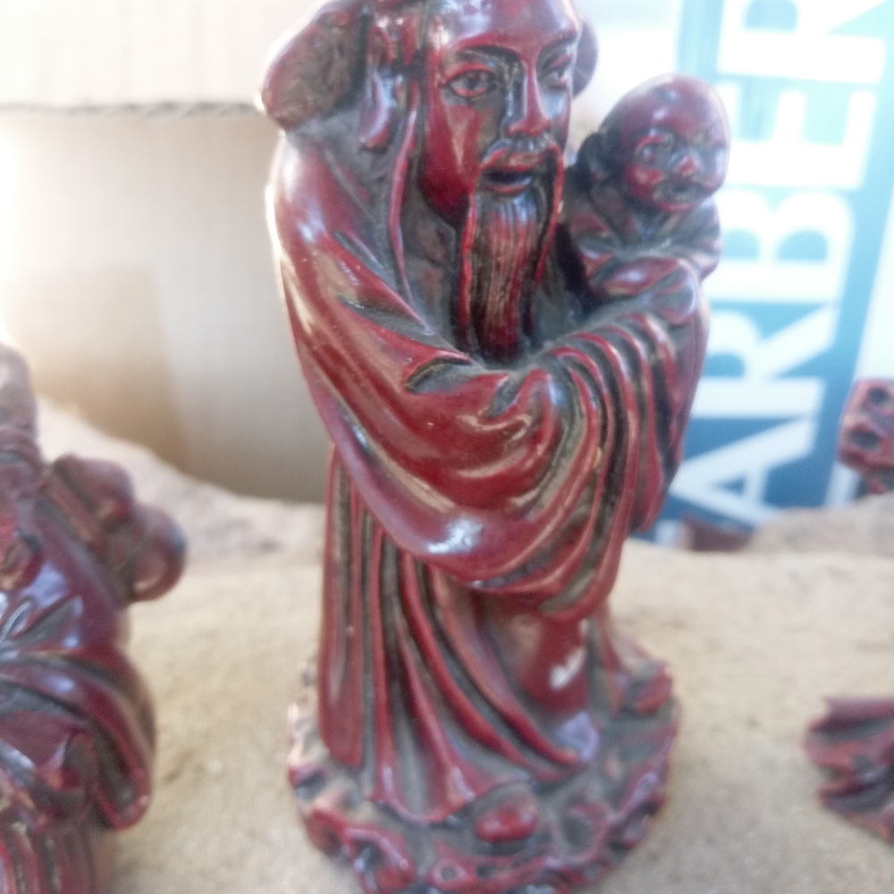 Red lac budda wise man statues